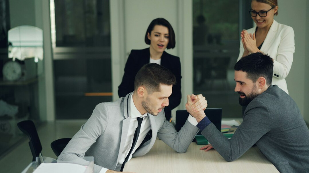 business people negotiating at table