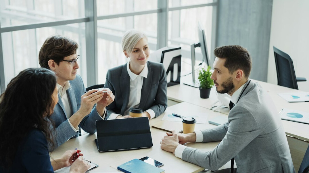 business people in discussion