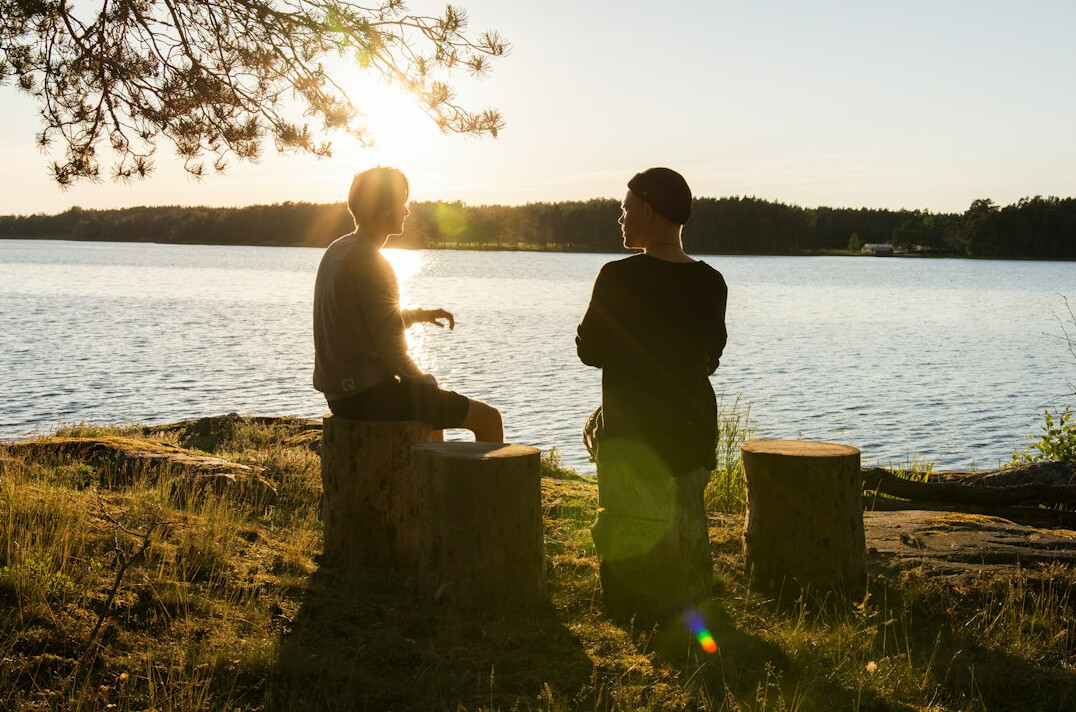two people in deep conversation